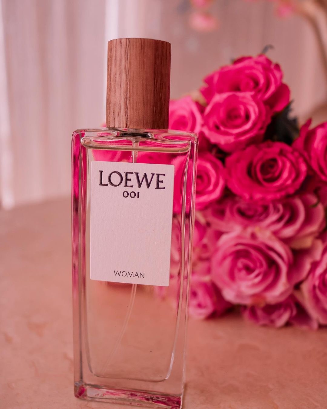 Loewe 001 Woman Eau De Parfum 2 - Nuochoarosa.com - Nước hoa cao cấp, chính hãng giá tốt, mẫu mới